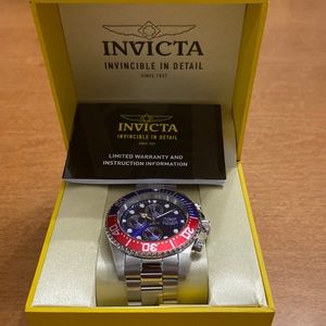 Invicta Watch- red and blue watch face with silver band- never worn